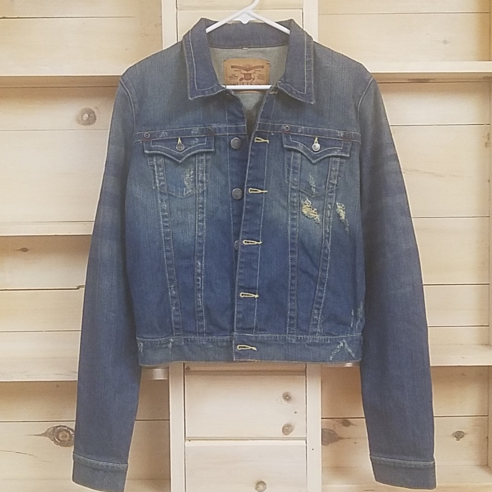 Distressed denim jacket